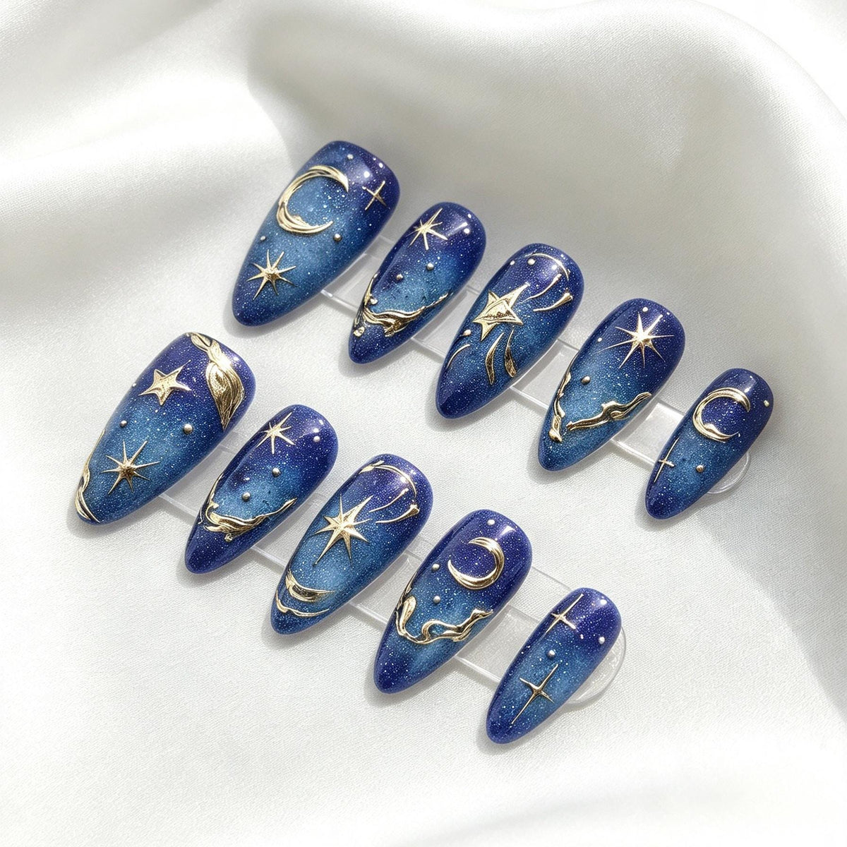 Deep Blue Celestial Press-On Nails With Gold Moons, Stars, and Shimmer