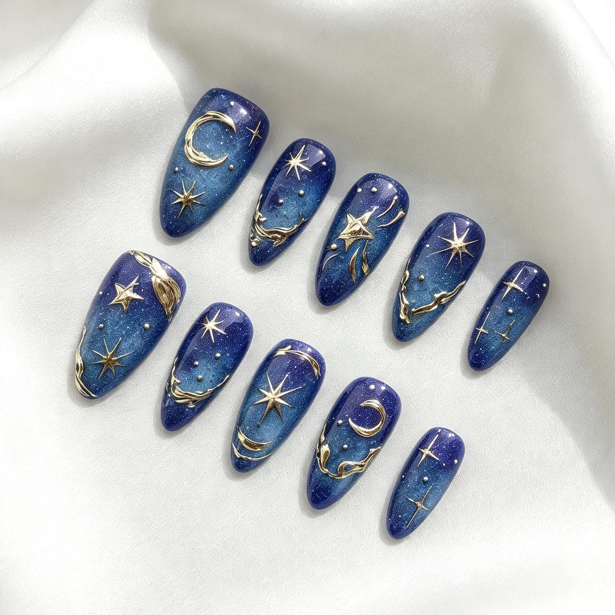 Deep Blue Celestial Press-On Nails With Gold Moons, Stars, and Shimmer
