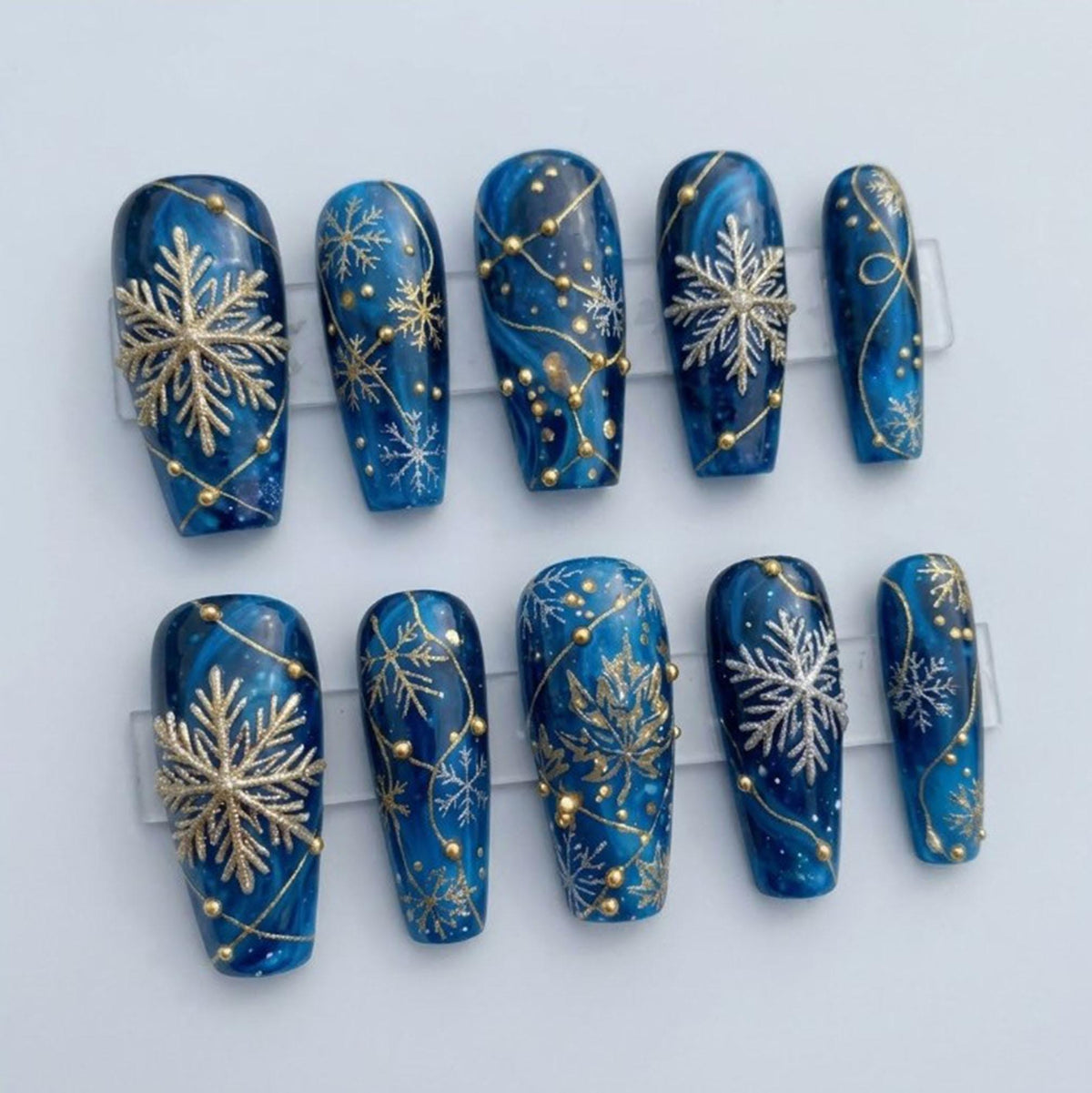 Deep Blue Winter Press On Nails with Silver Snowflakes and Gold Details