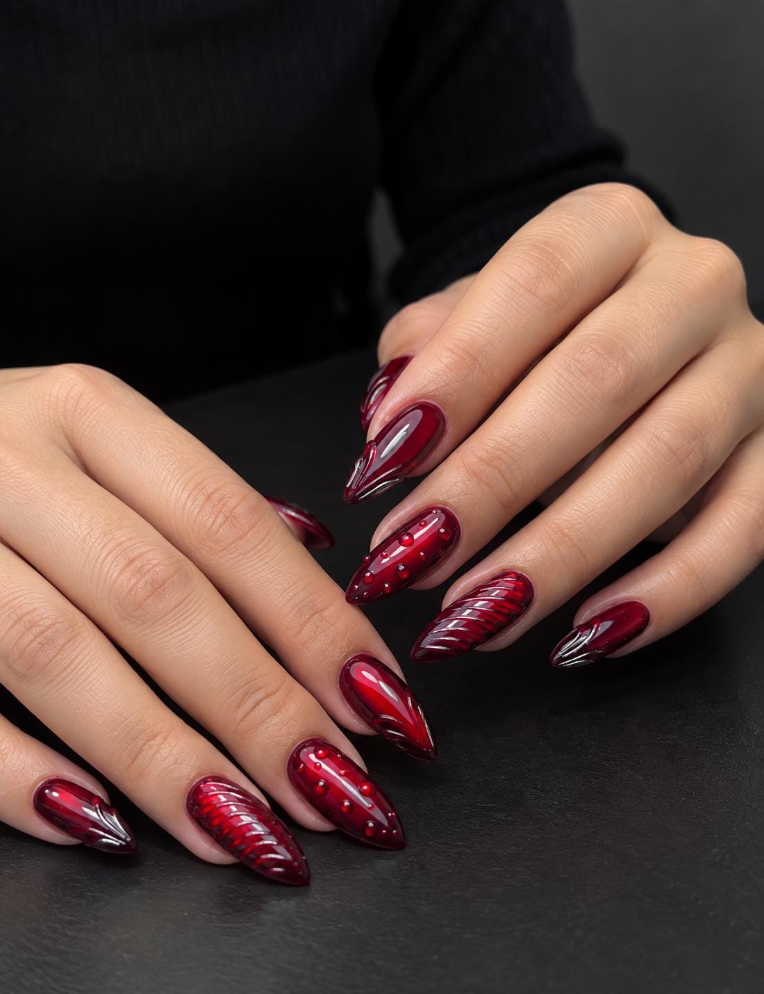 Deep Cherry Red Cat Eye Nails With Silver Stud Details