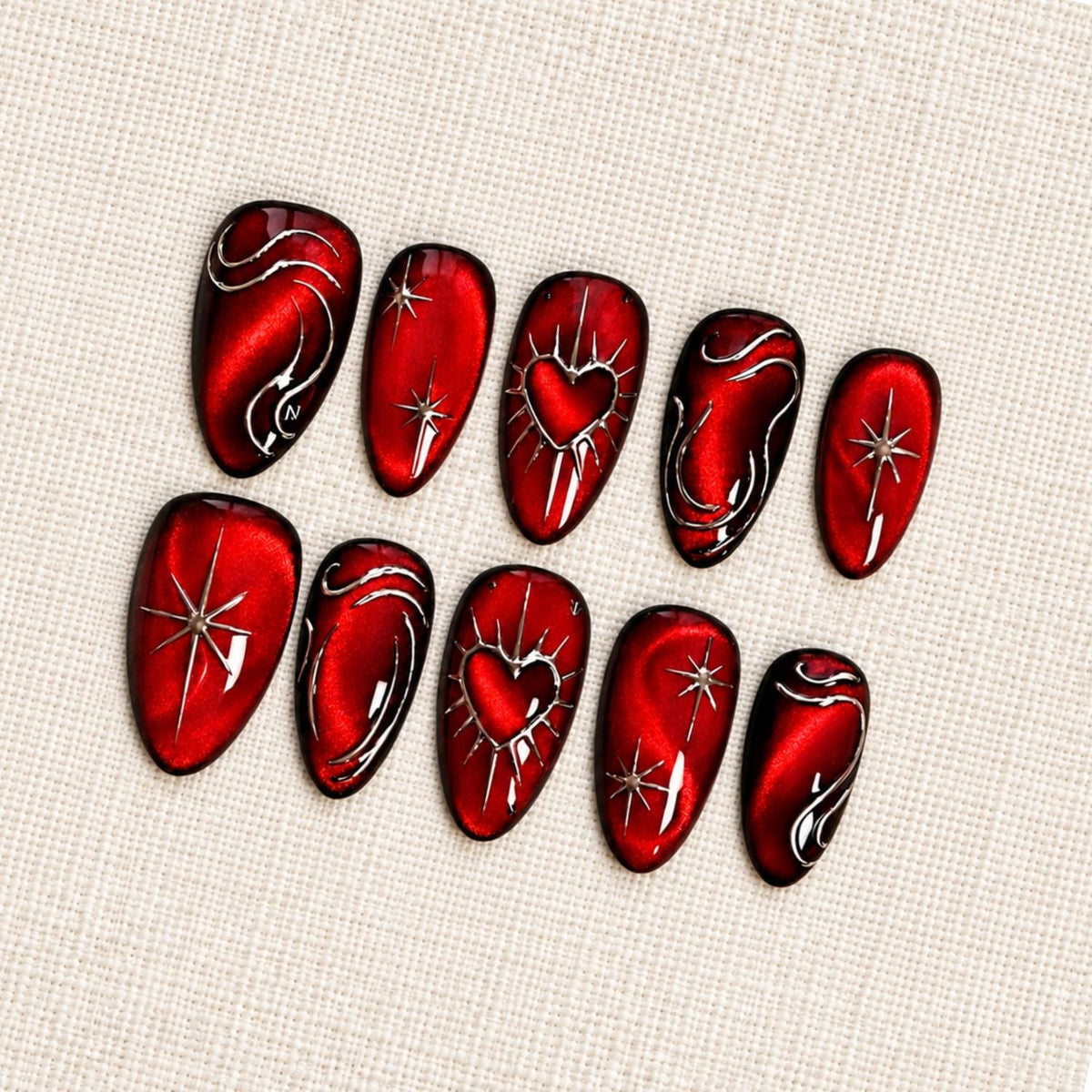 Deep Red Cat Eye Press On Nails with Silver Chrome Swirls, Starbursts and Hearts, Gothic Y2K