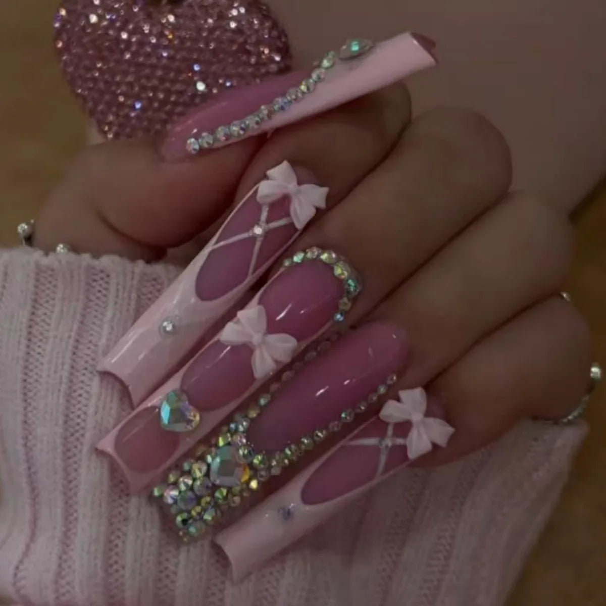 Dusty Mauve French Tip Nails with Crisscross Bows and Iridescent Rhinestones