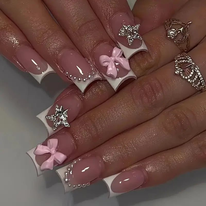 Dusty Pink French Tip Nails With 3D Bows, Silver Star Charms and Rhinestones