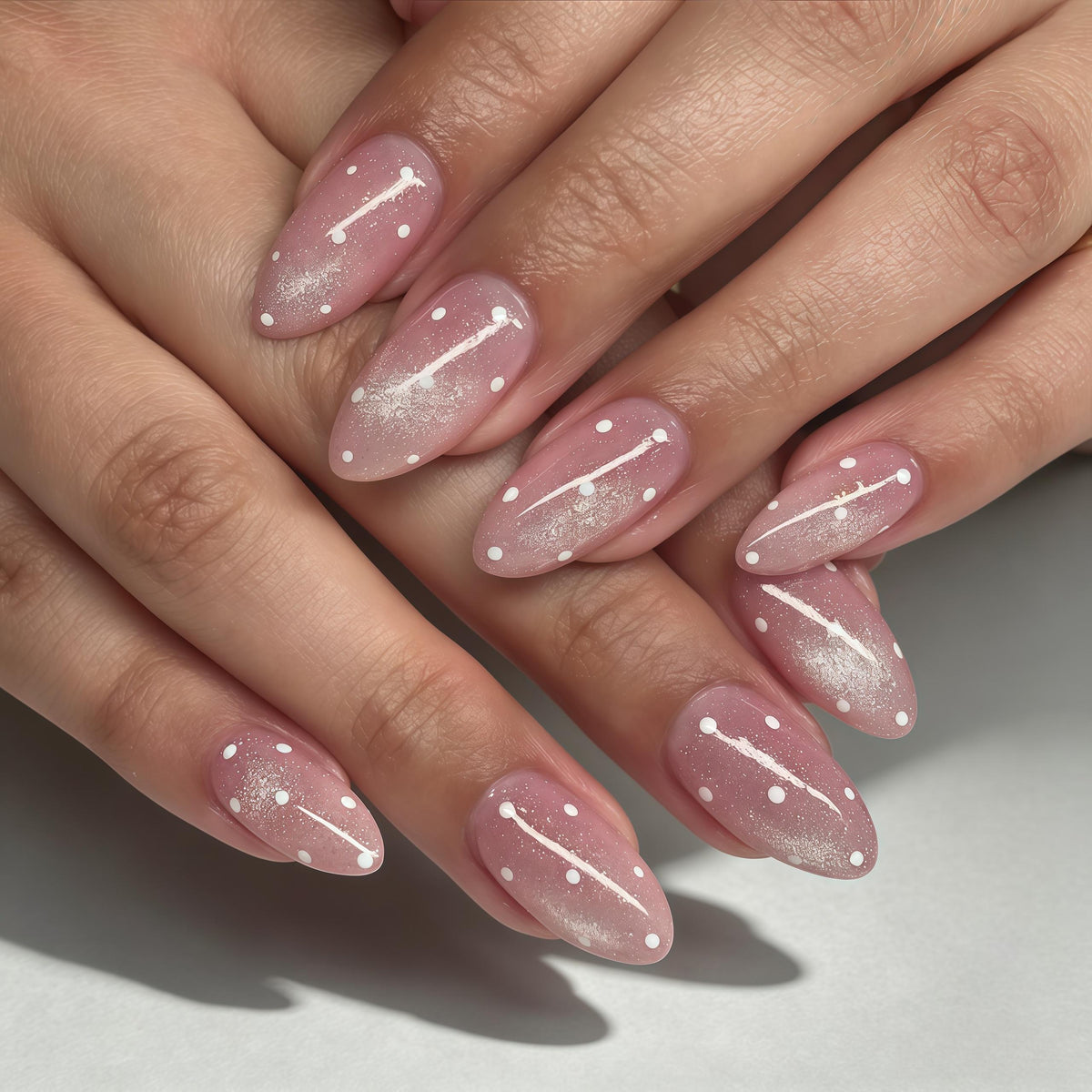 Dusty Pink Glitter Nails With White Dotted Diagonal Lines