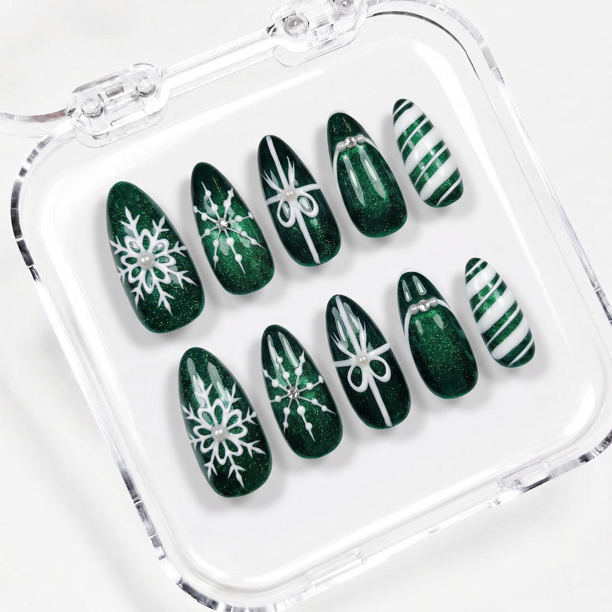 Emerald Green Cat Eye Christmas Nails With White Snowflakes, Bows and Candy Cane Stripes