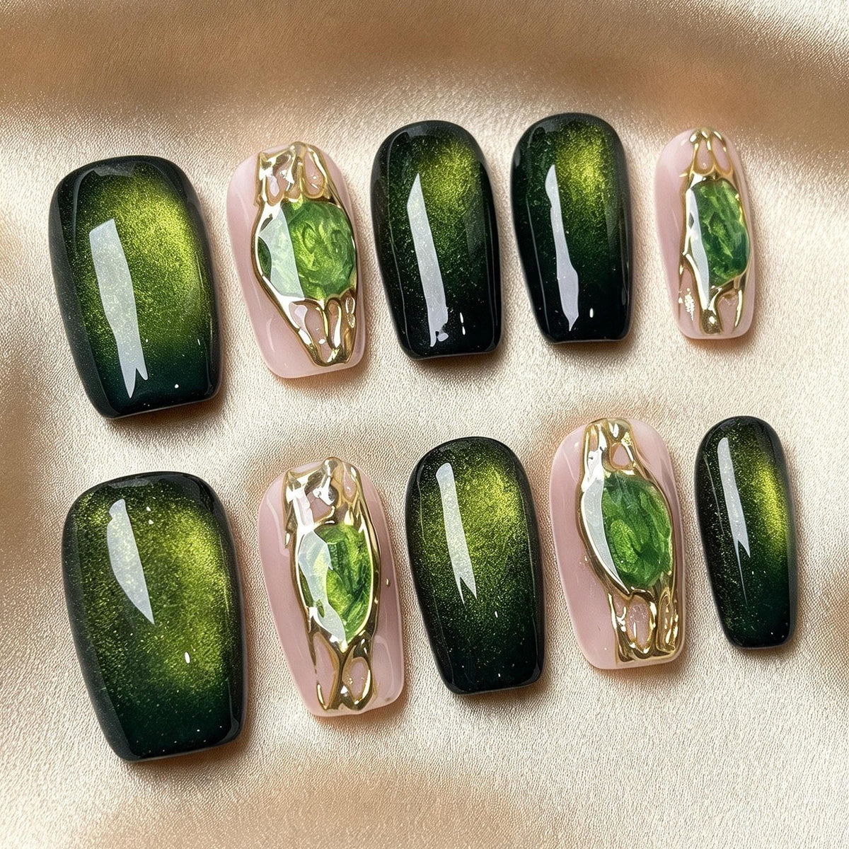 Emerald Green Cat Eye Nails With Gemstone Accents and Gold Frames