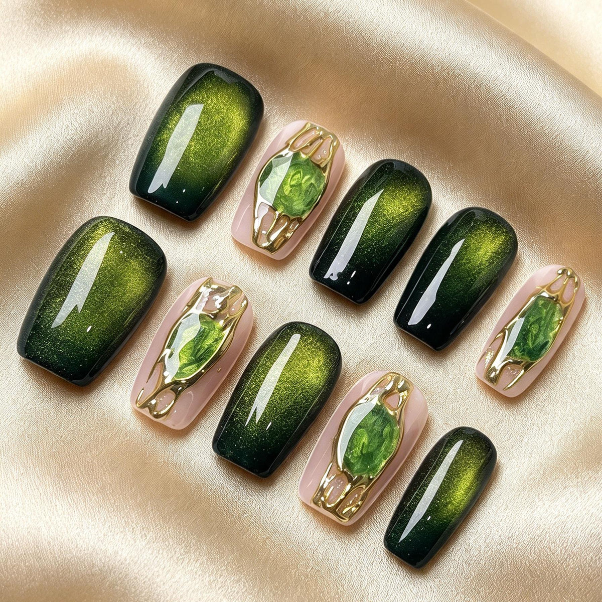 Emerald Green Cat Eye Nails With Gemstone Accents and Gold Frames