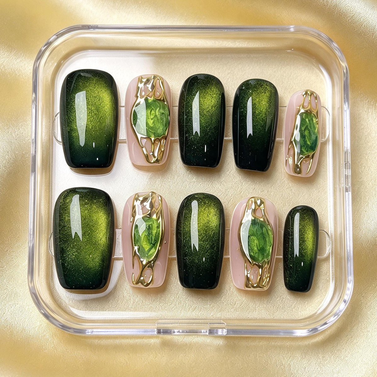 Emerald Green Cat Eye Nails With Gemstone Accents and Gold Frames