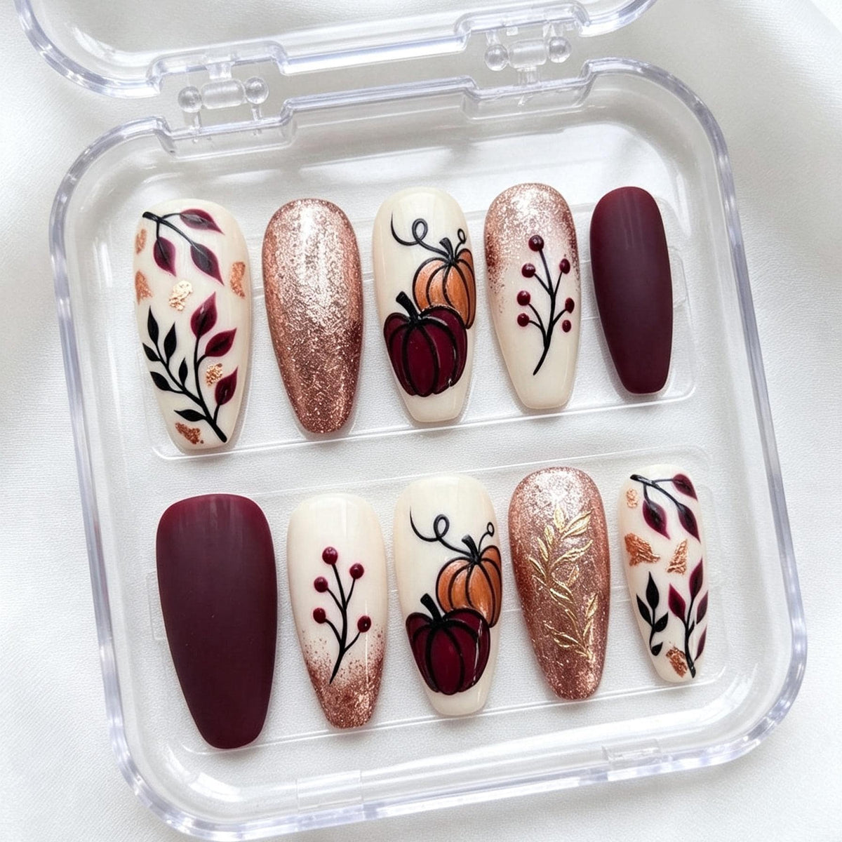 Fall Burgundy Pumpkin and Botanical Nails With Rose Gold Glitter