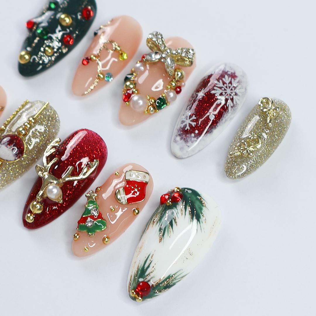 Festive Christmas Press-On Nails with Reindeer, Ornaments and Gold Glitter