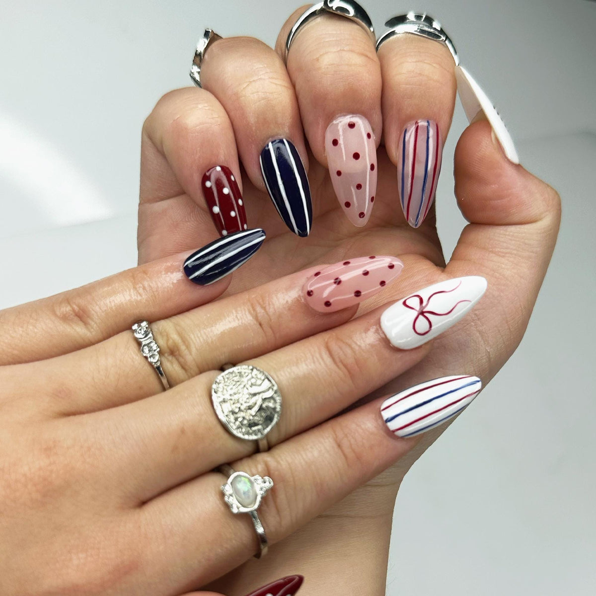 Fourth of July Patriotic Nails with Burgundy, Navy, Pink, Stripes, Dots, Bow, and Flag