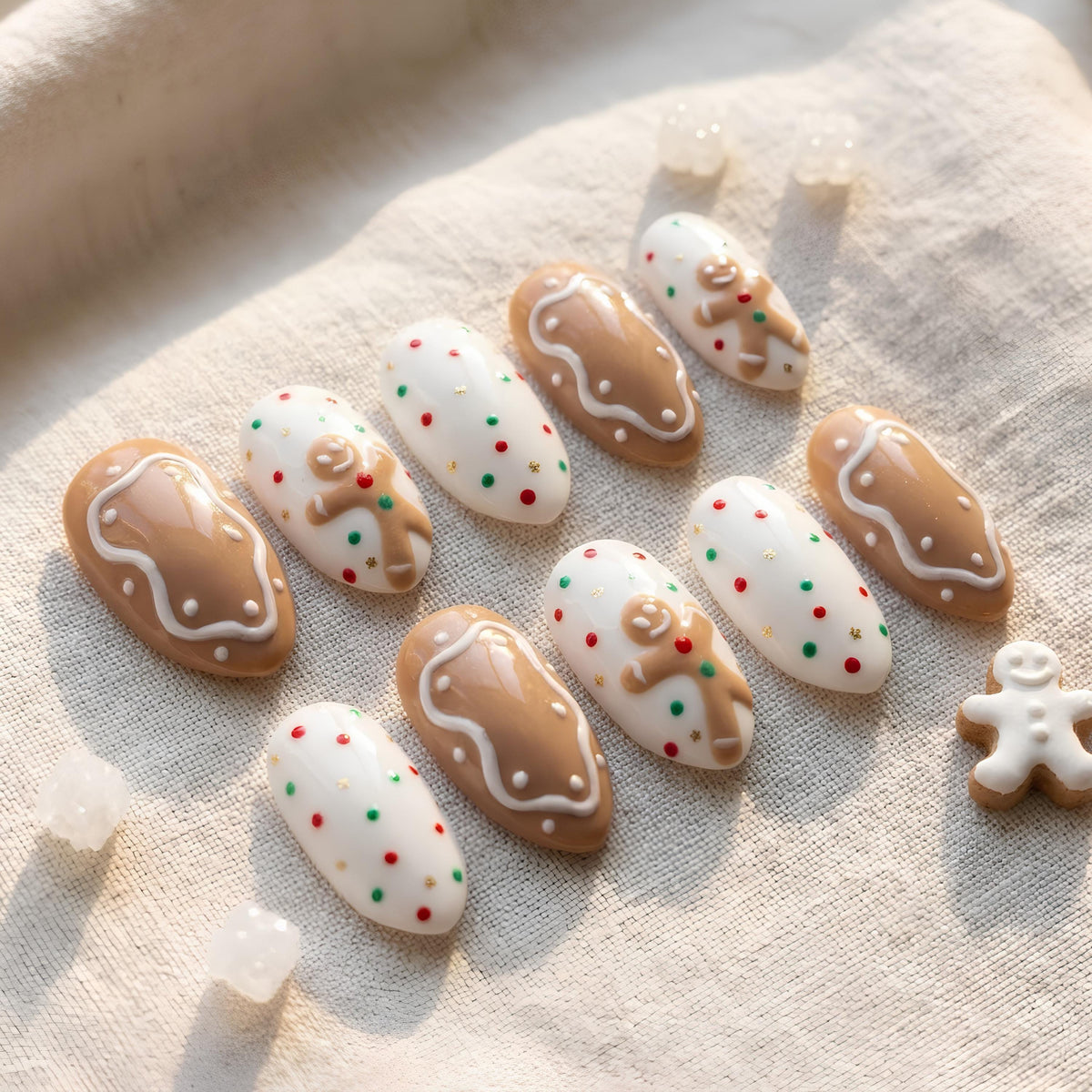 Gingerbread Man Nails With Icing Details and Festive Dots
