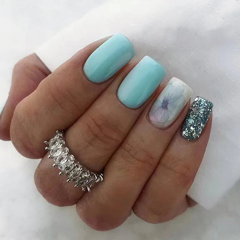 Glossy Mint Aqua Nails with Silver Glitter and Marble Accents