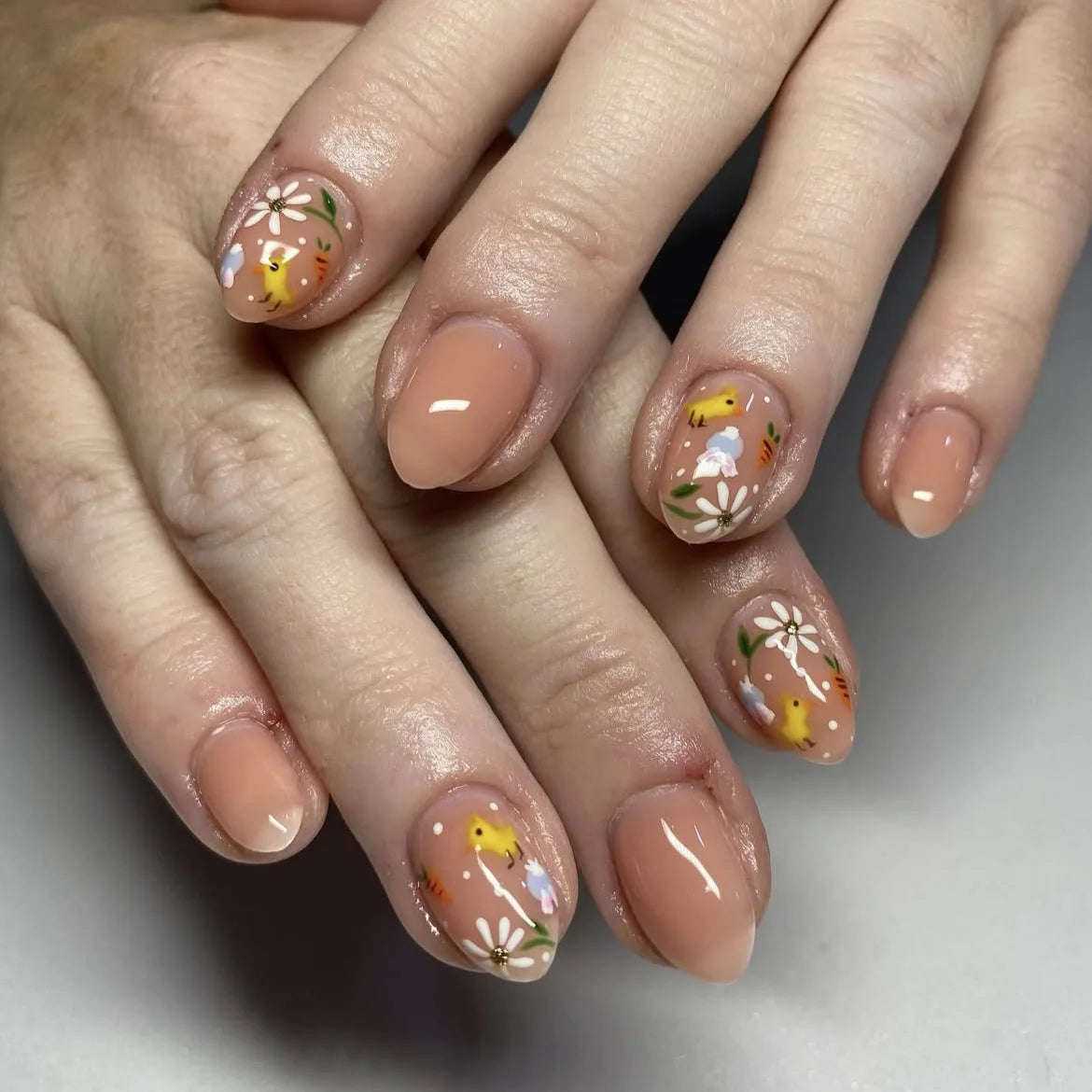 Glossy Nude-Pink Floral Press-On Nails with Tiny White Flowers