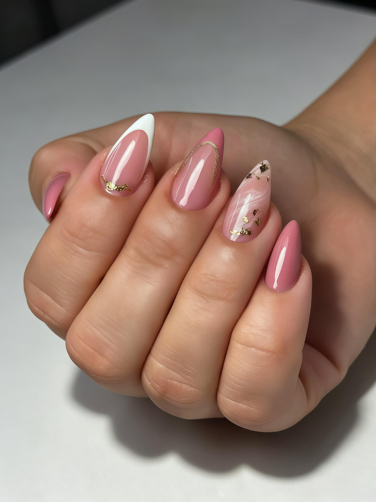 Glossy Peach Pink French Tip Nails With Gold Foil and Marble Accents
