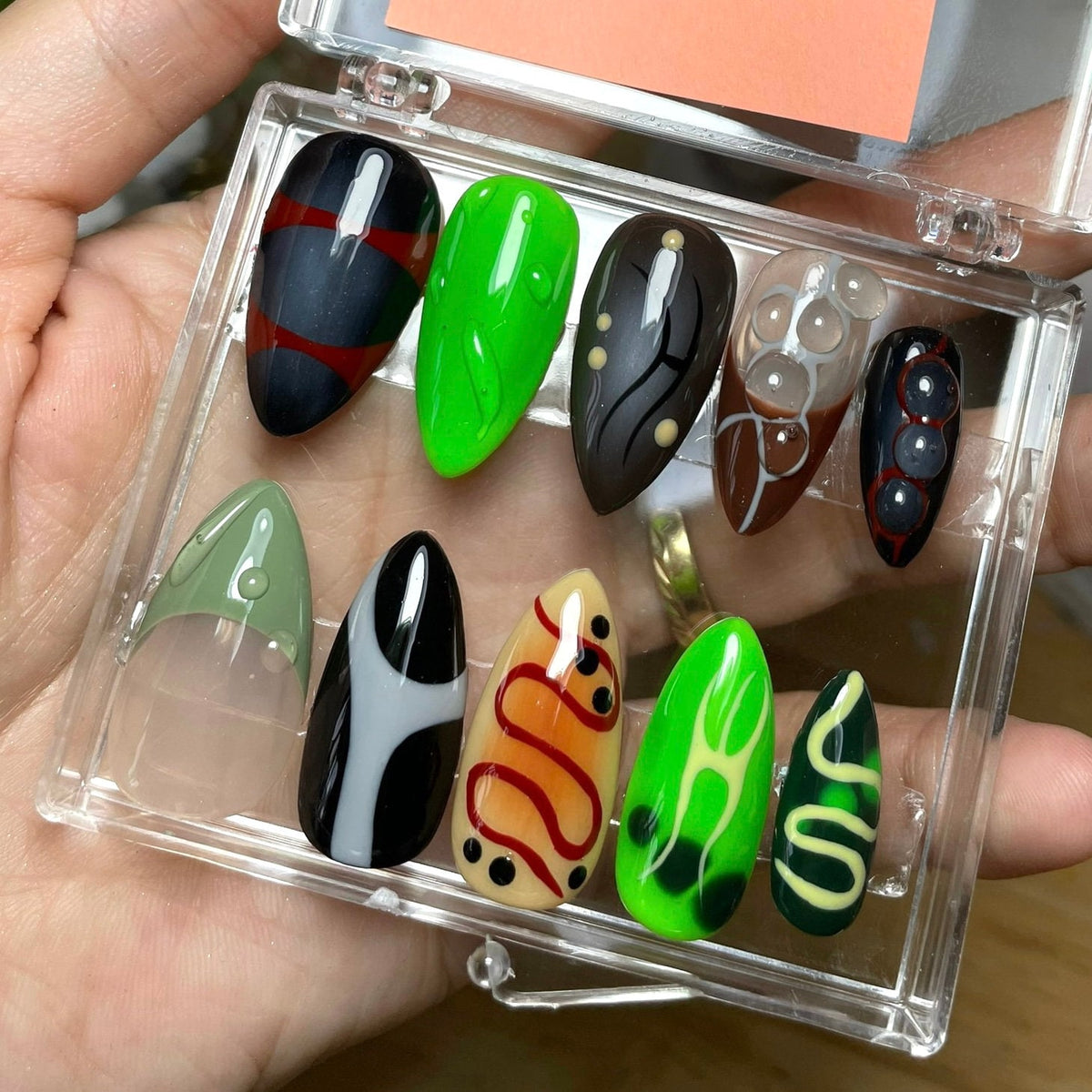 Gothic Abstract Swirl Press On Nails in Black, Lime Green, Brown, and Neutral Tones
