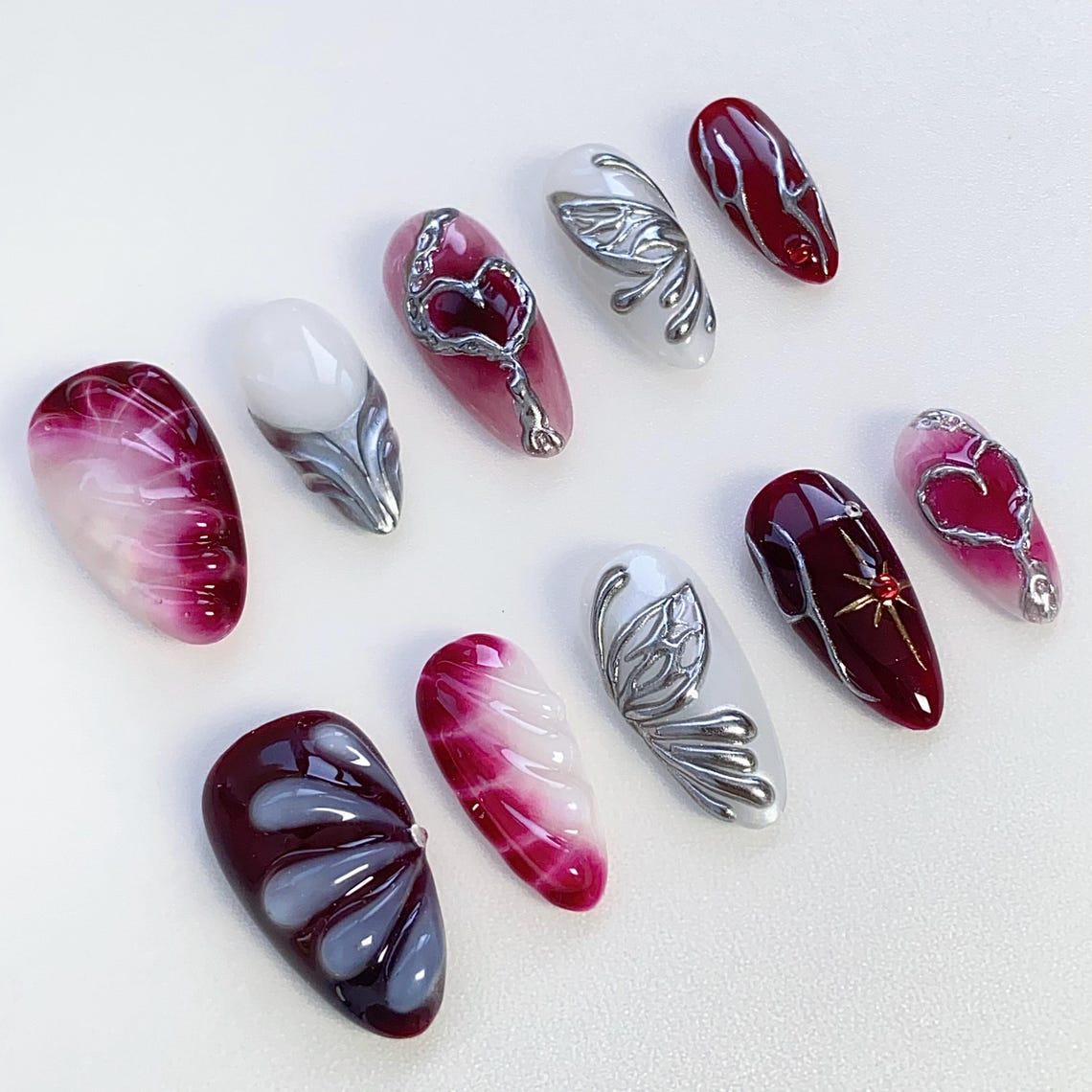 Gothic Y2K Burgundy, Pink and White Marble Nails with Sculpted Silver Details