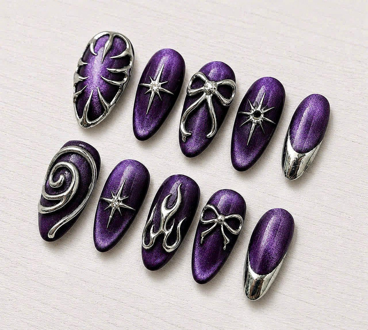 Gothic Y2K Purple Cat-Eye Chrome Nails With Silver Bows, Starbursts & French Tips