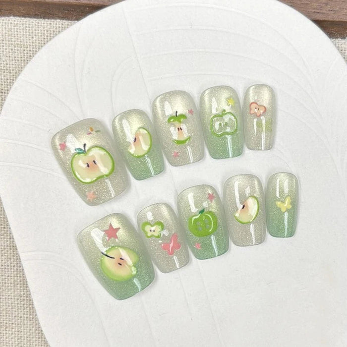 Green Cat-Eye Glitter Press On Nail Set With Apple, Butterfly, and Star Details