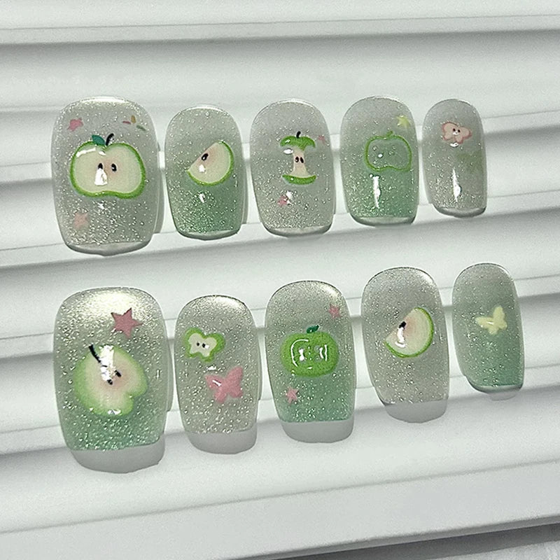 Green Cat-Eye Glitter Nail Set With Apple, Butterfly, and Star Details