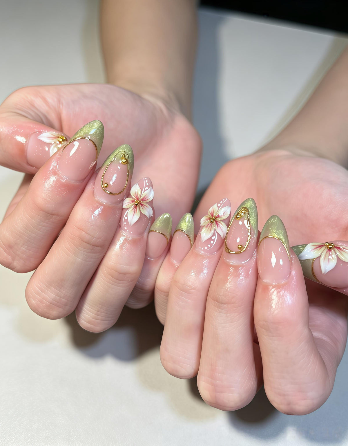 Green Shimmer French Tip Spring Nails With Raised Floral and Gold Wire Details