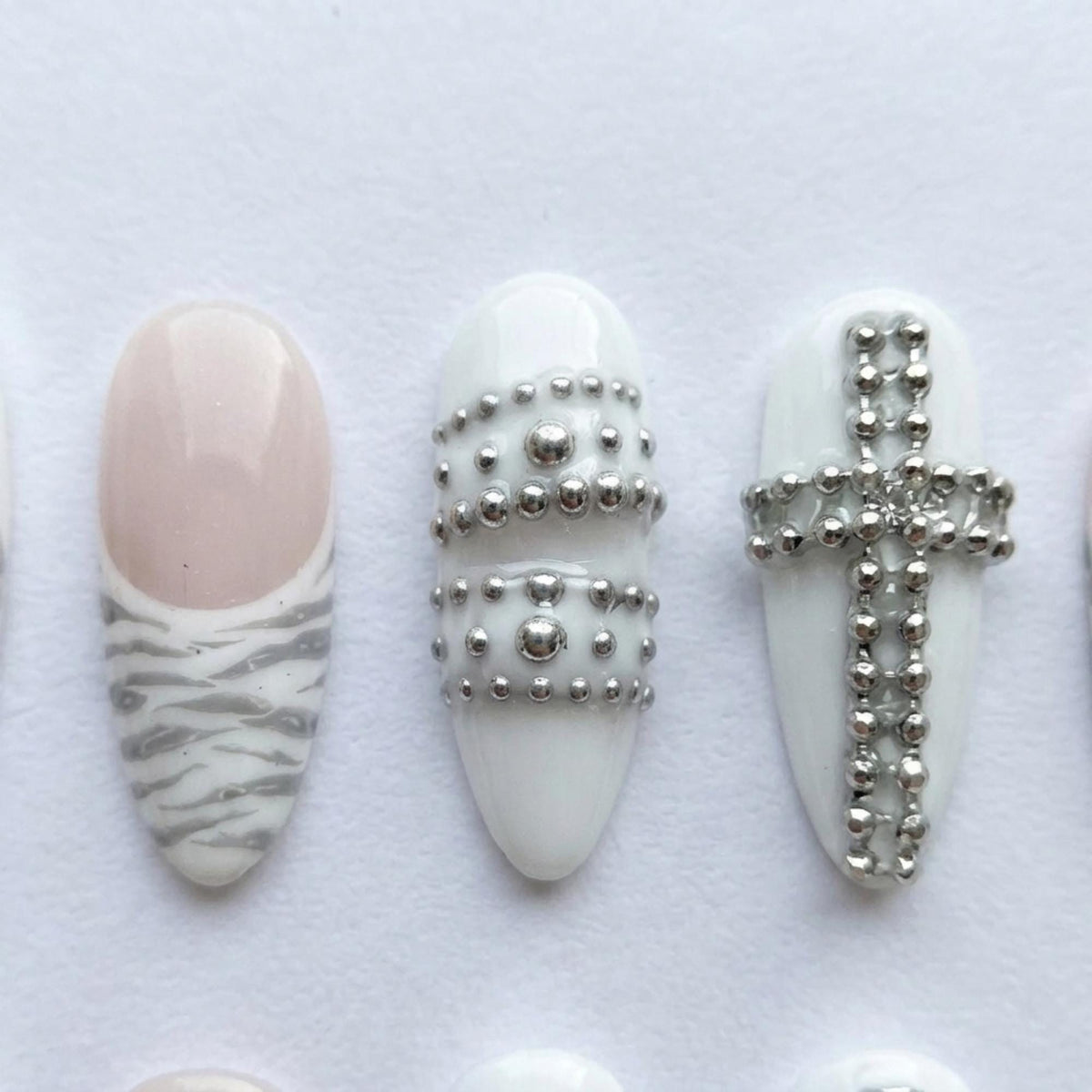 Grey Leopard and Zebra Print Nails with Silver Bead Crosses