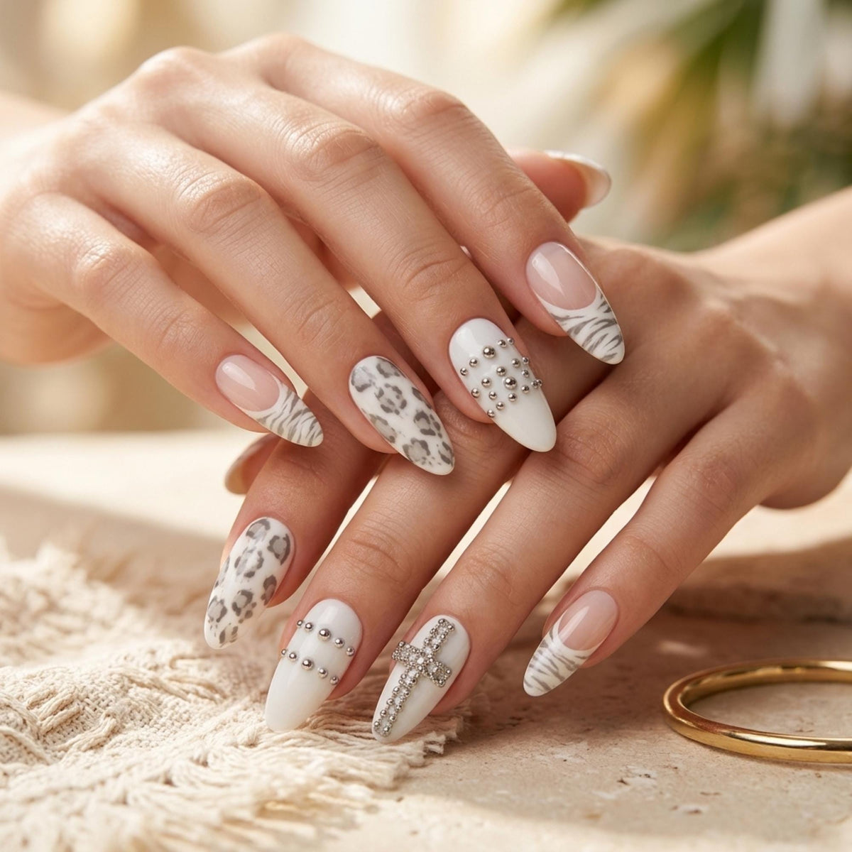 Grey Leopard and Zebra Print Nails with Silver Bead Crosses