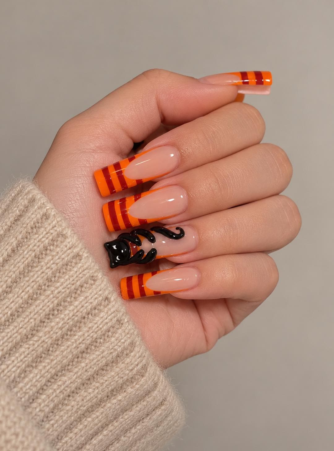 Halloween Cat Press On Nails With Orange Tips and Dark Red Stripes