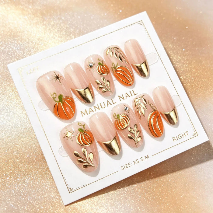 Halloween Pumpkin Press On Nails With Nude Pink Base, Gold Leaf Accents and Metallic French Tips