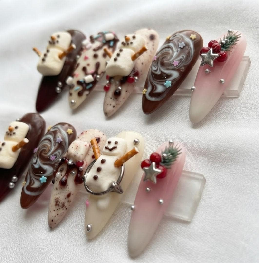 Hot Cocoa Snowman Nails With Chocolate Swirls and Sweet-Treat Details