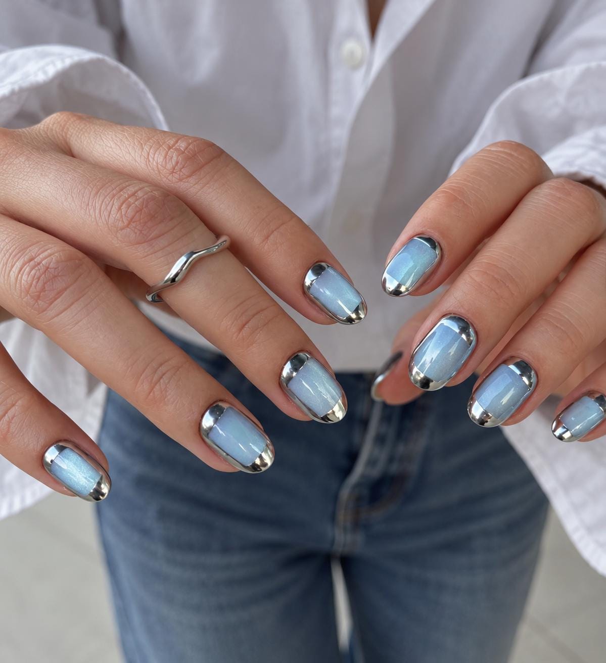 Icy Blue Cat Eye Nails With Silver Chrome French Tips