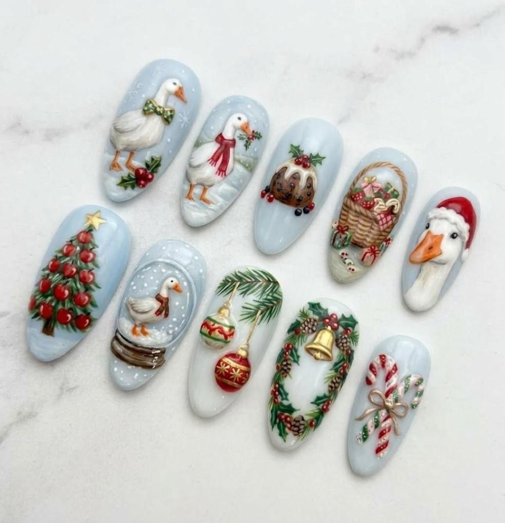 Icy Blue Christmas Nails With Painted Geese, Ornaments, a Tree, and Candy Canes