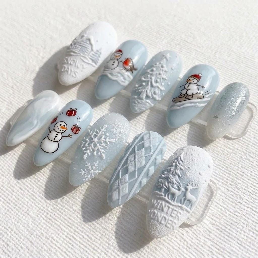 Icy Blue Christmas Press-On Nails With 3D Snowmen, Cabins, Trees, and Snowflakes