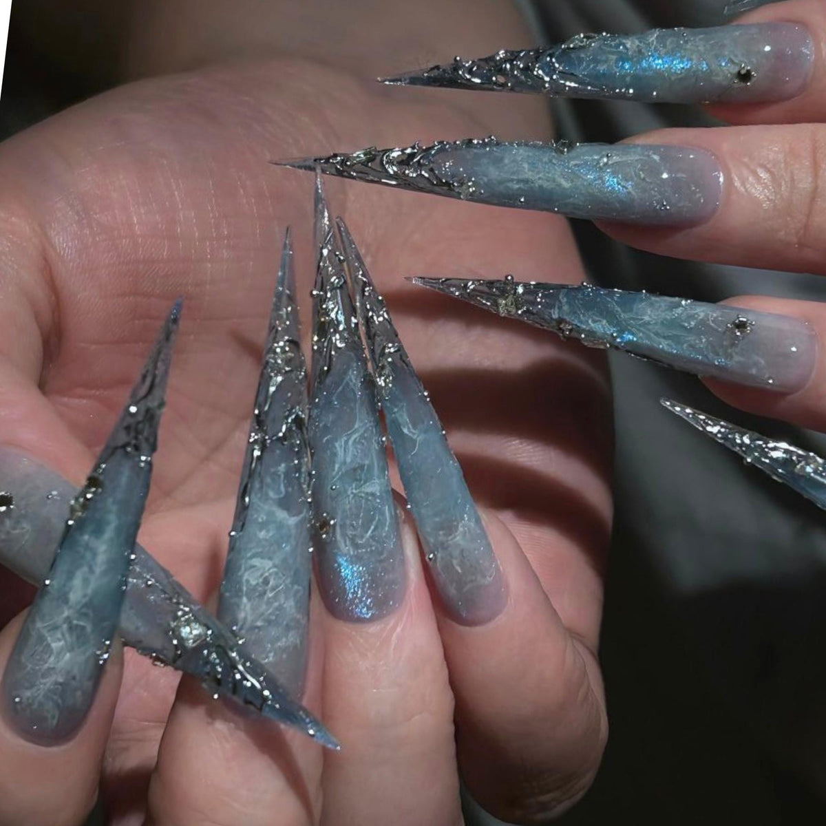 Icy Blue Gothic Marble Nails With Jagged Silver Chrome Accents