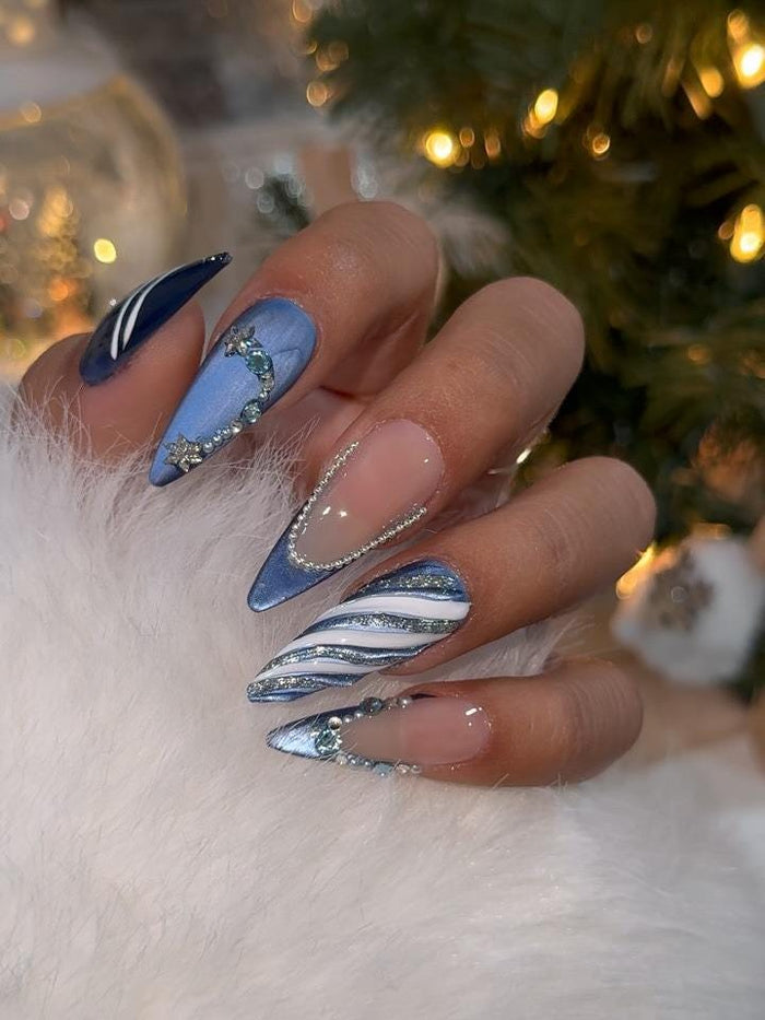 Icy Blue Winter Cat Eye Press On Nails With Silver Beads, Star Charms and Wavy Stripes