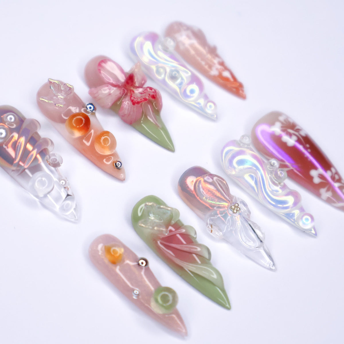 Iridescent Pearl Floral Nail Set with Raised Pink Flowers and Ornate Swirls