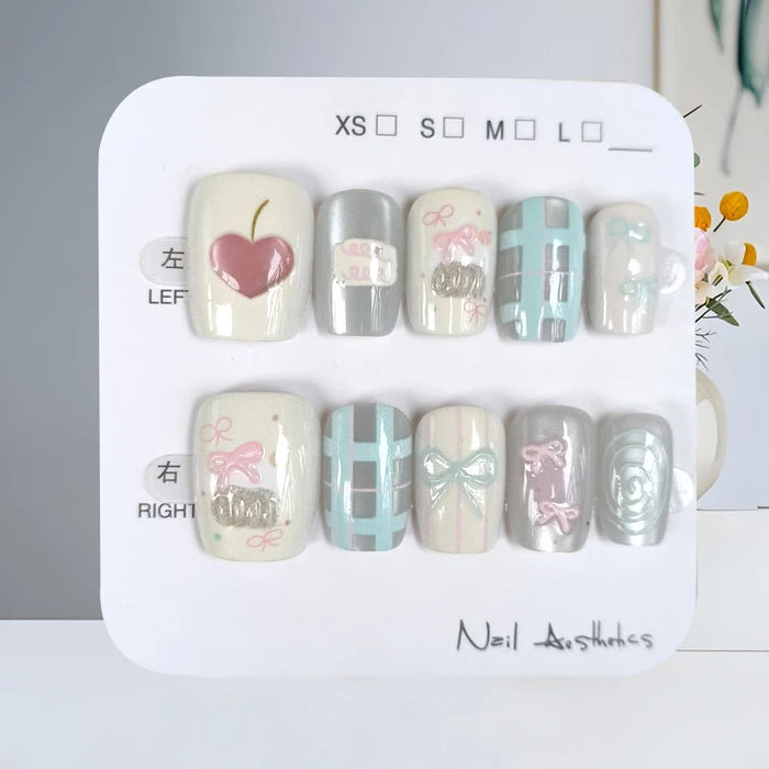 Ivory and Mint Grid Press On Nails with Pink Hearts, Bows, and Silver Rose
