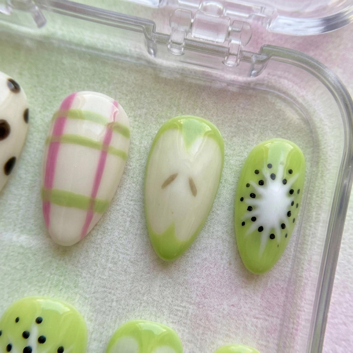 Kiwi-Inspired Fruit Nail Set With Pink Stripes, Plaid, and Polka Dots