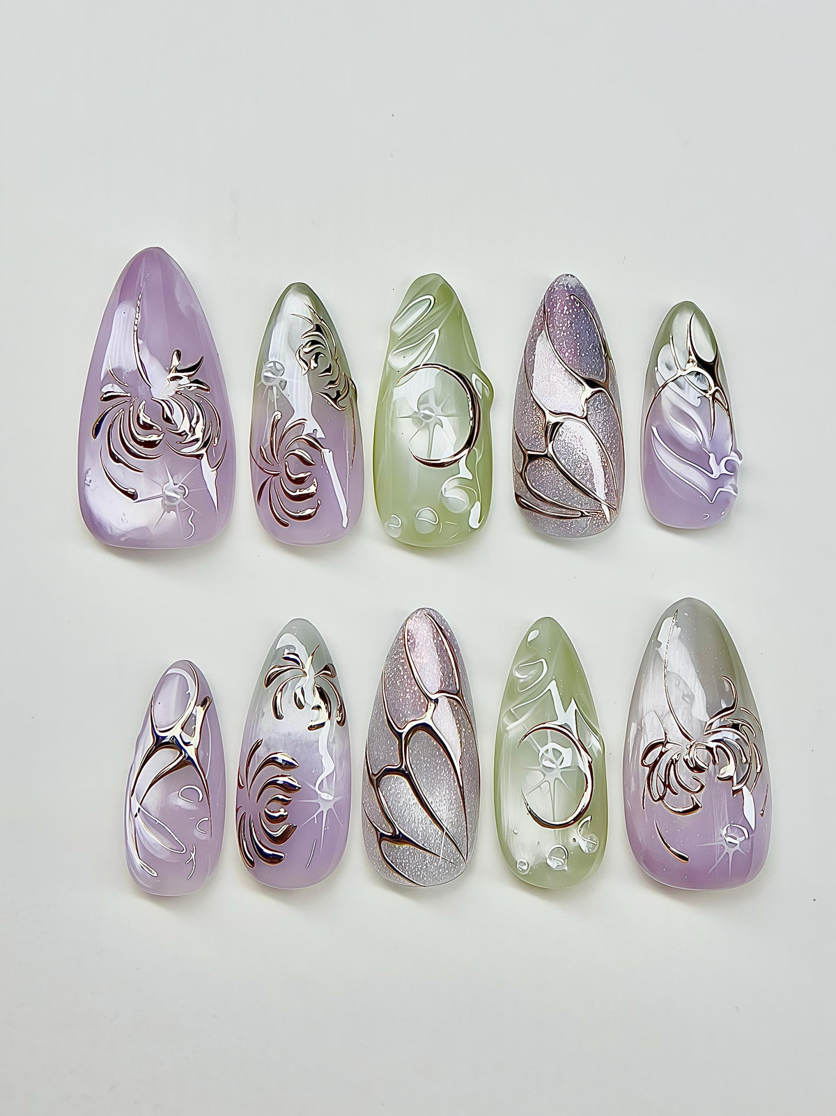Lavender and Green Celestial Nails with Chrome Butterfly and Floral Details
