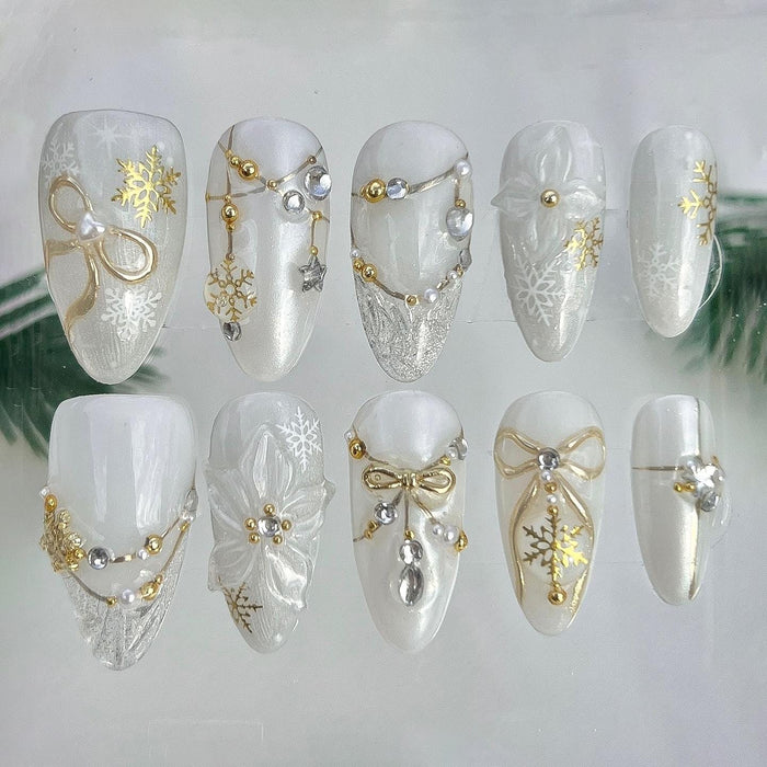 Milky White Christmas Snowflake Press On Nails With Gold Bows, Rhinestones and Charms