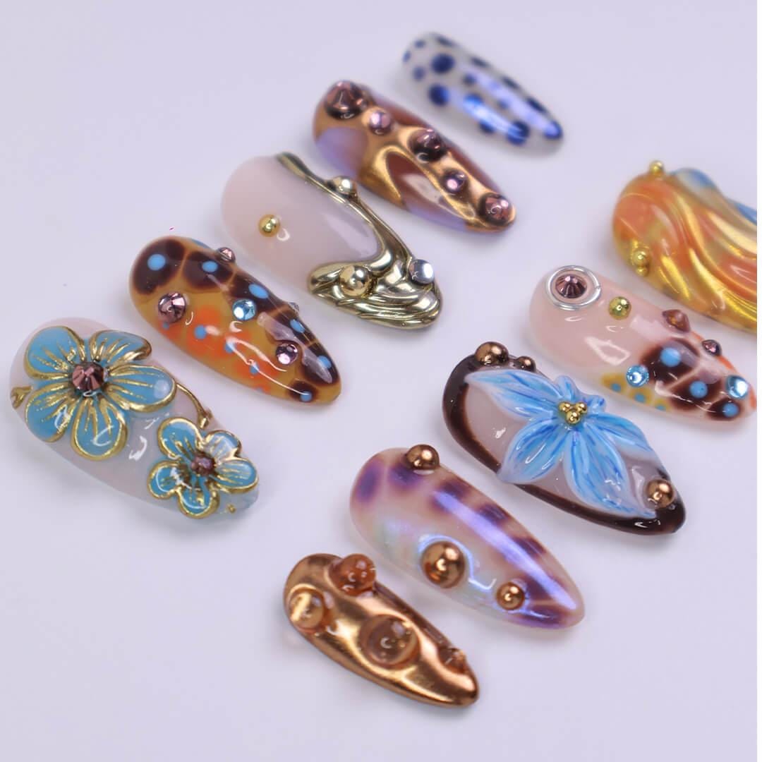 Multicolor Blue Floral Press On Nails with Bronze-Gold Chrome, Rhinestones, and Y2K Party Style