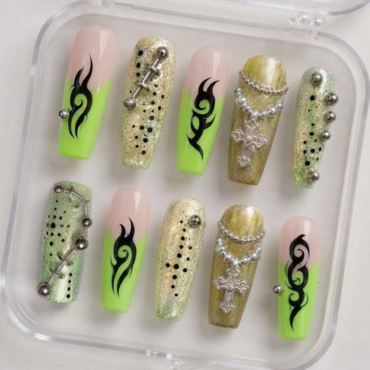 Neon Green French Tip Nails with Black Tribal Flames and Cross Charms