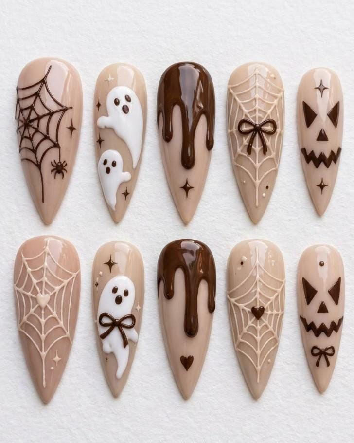 Neutral Brown Halloween Nails With Ghosts, Spiderwebs, Bows, and Jack-O’-Lantern Faces