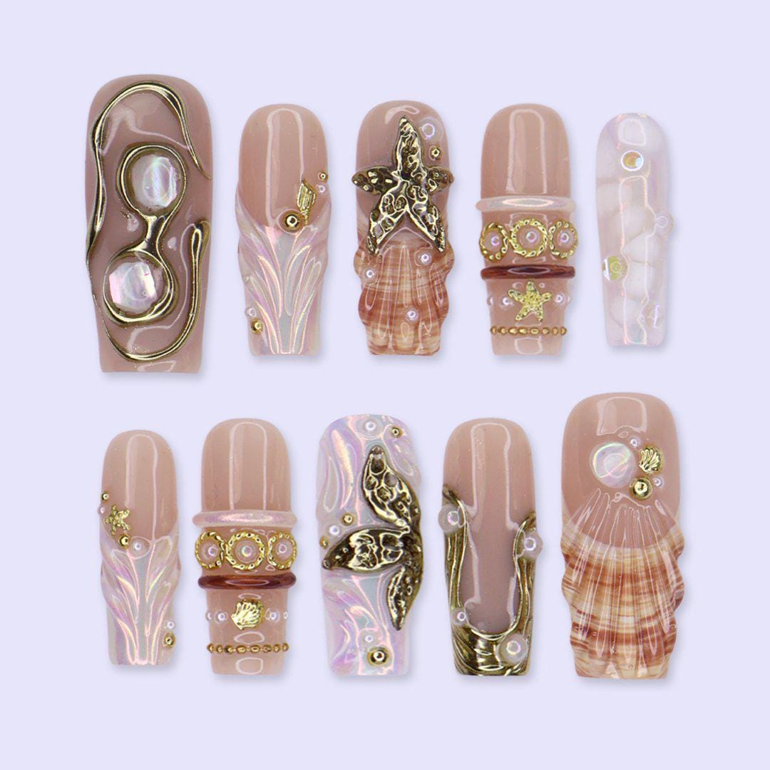 Nude Beige Ocean Nails with Iridescent Shells, Gold Sea-Star Charms and Pearls