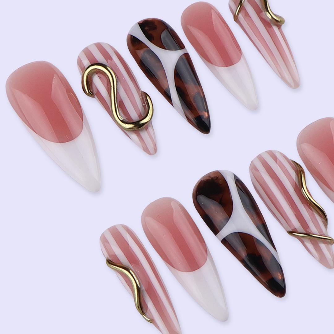 Nude Blush and Tortoiseshell Nails with Stripes and Gold Accents