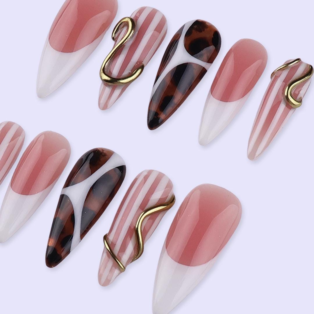 Nude Blush and Tortoiseshell Nails with Stripes and Gold Accents