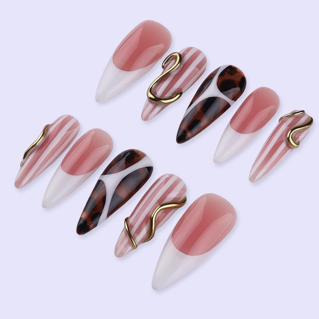 Nude Blush and Tortoiseshell Nails with Stripes and Gold Accents