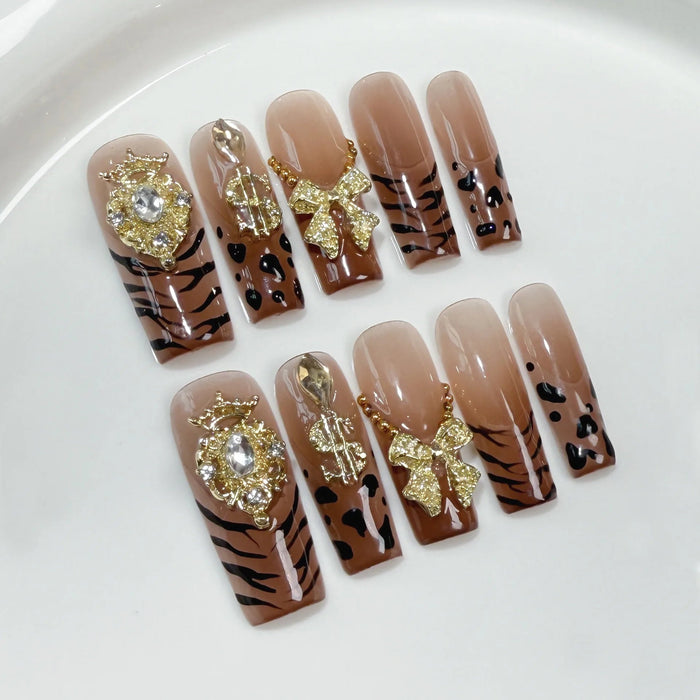 Nude Brown Tiger Stripe Press On Nails with Gold Bows and Jeweled Details