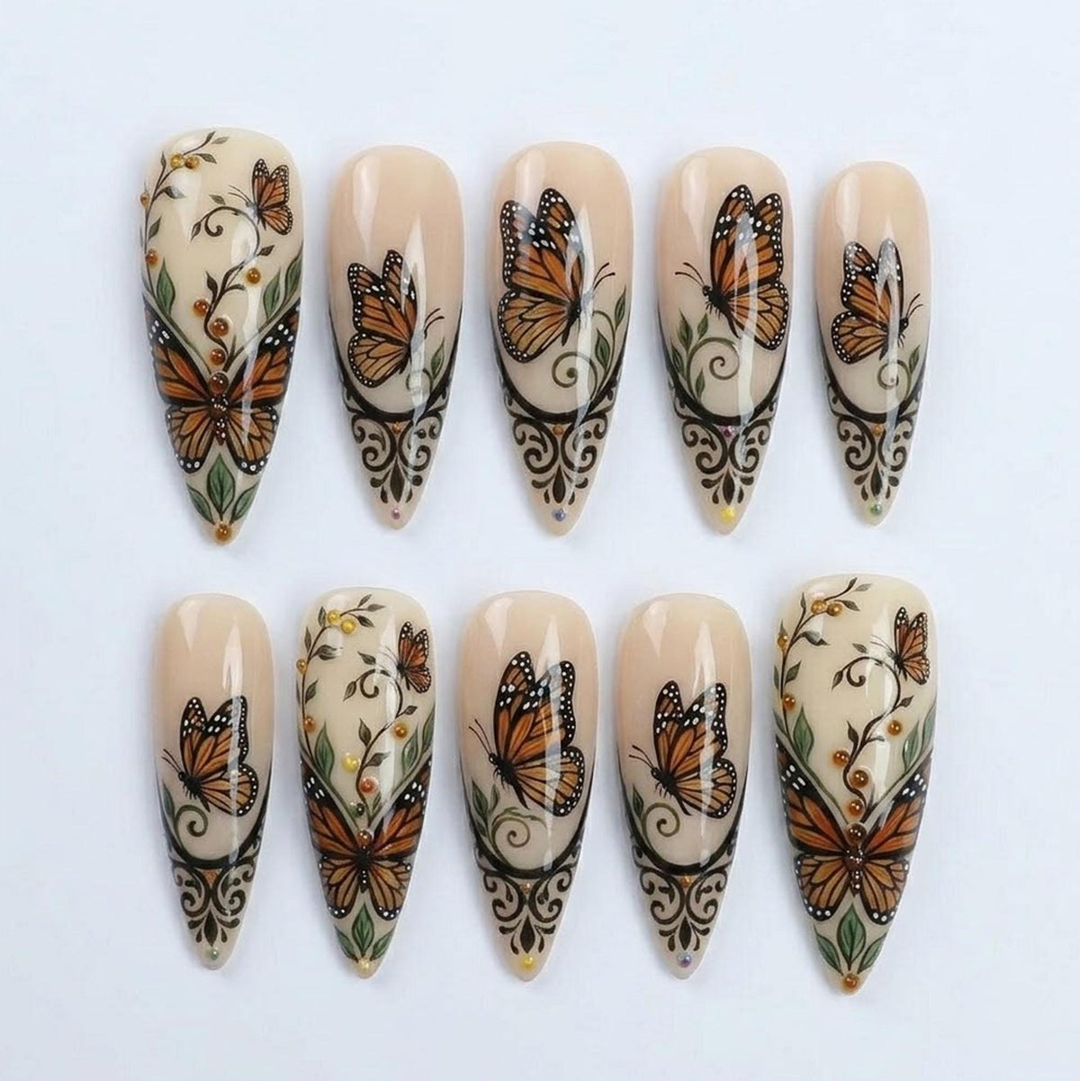 Nude Butterfly Press-On Nails With Orange Wings, Black Botanical Scrollwork & Gold Accents