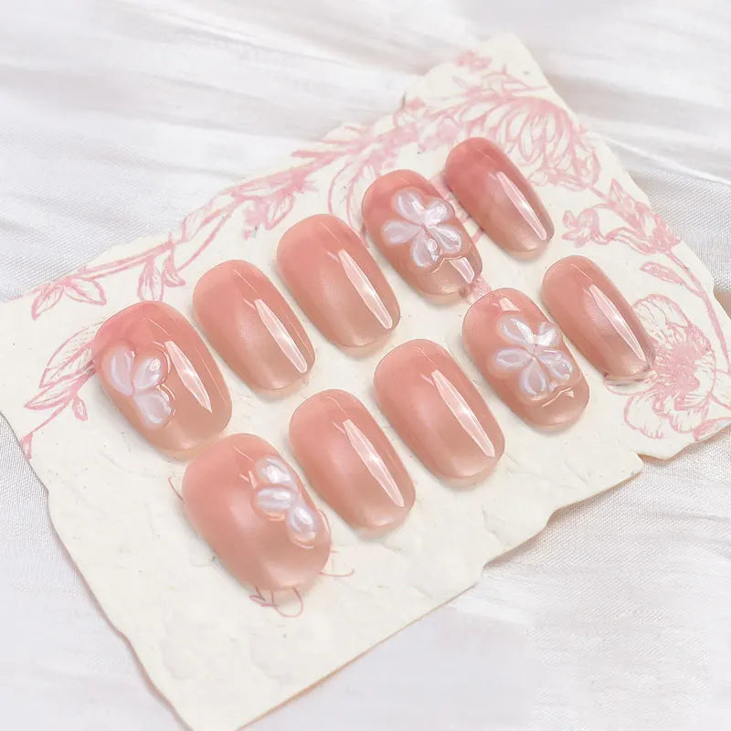 Nude Peach Cat Eye Nails With 3D White Flowers